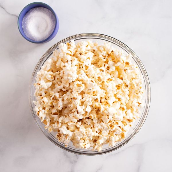 A bowl of popcorn on a marble surface Credit: Casey Barber