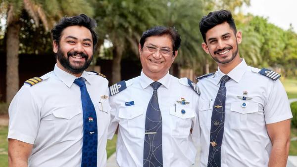 Akshat Saxena with his father and brother
