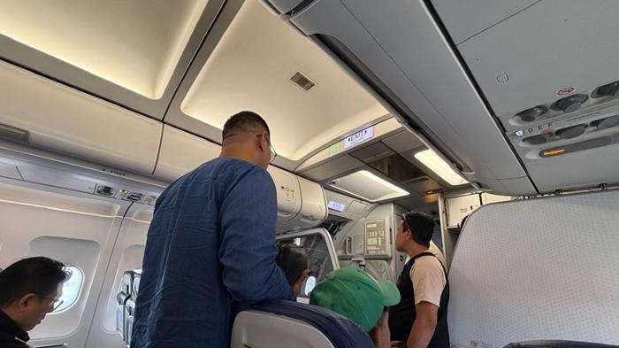 TIBA DI BALIKPAPAN - Dokumentasi dari pemumpang pesawat Super Air Jet IU 535 kembali mendarat di Balikpapan dan penumpang diarahkan kembali turun ke gate karena kondisi kabut asap yang tebal di runway Bandara Juwata Tarakan, Senin (31/8/2026). DOKUMENTASI ADE PRASETYA
