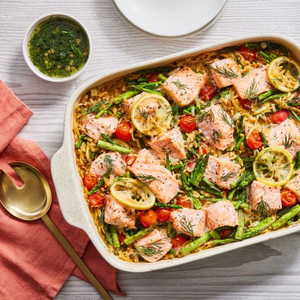 a recipe photo of the Salmon Orzo Casserole with Lemon Dill Credit: Stacy k. Allen, Props: Julia Bayless, Food Stylist: Ana Kelley