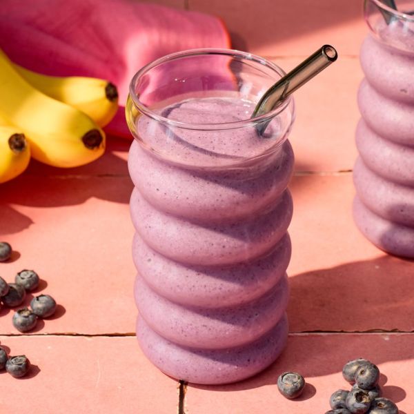A recipe image of Banana-Blueberry Chia Seed Smoothie Credit: Photographer: Carson Downing, Food Stylist: Annie Probst, Prop Stylist: Breanna Ghazali.