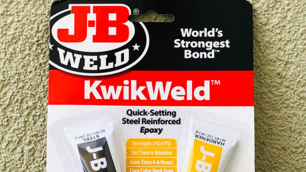 A close-up of J-B Weld KwikWeld epoxy