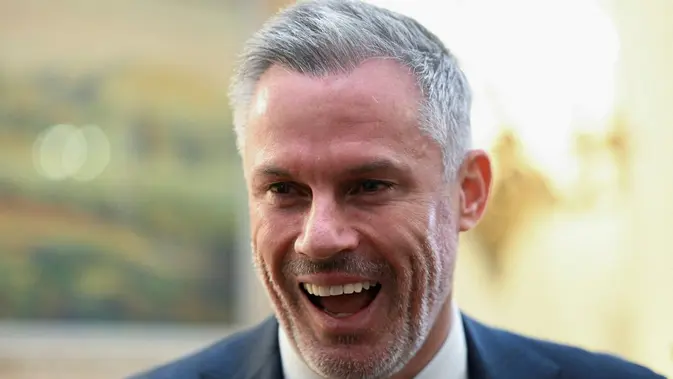 Jamie Carragher Mantan pemain Liverpool sekaligus pundit sepak bola Inggris, Jamie Carragher. (Jaimi Joy/POOL/AFP)