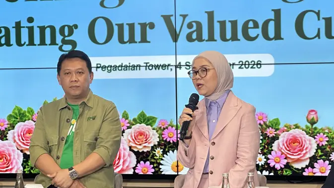 Wakil Direktur Utama PT Pegadaian (Persero) Budi Wahju Soesilo dan Direktur Pemasaran, Penjualan, dan Pengembangan Produk PT Pegadaian (Persero) Selfie Dewiyanti. ©Liputan6/Wuri Anggarini
