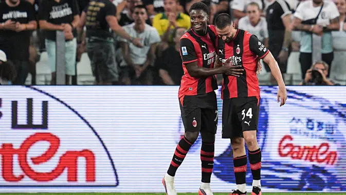 AC Milan Pemain AC Milan Alphadjo Cisse (kiri) merayakan gol yang dicetaknya ke gawang Juventus dalam pertandingan Serie A di Turin, Italia, Minggu, 7 September 2026. (Marco Alpozzi/LaPresse via AP)