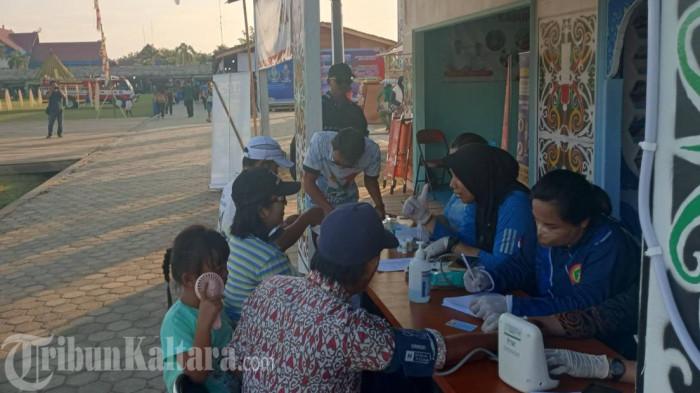 DETEKSI FLU SINGAPURA - Aktivitas pemeriksaan kesehatan warga Malinau, Kalimantan Utara, sebagai upaya deteksi penyakit secara terpadu di wilayah Malinau, Minggu (30/8/2026).Flu Singapura sangat agresif di lingkungan anak, Dinkes Malinau meminta seluruh Faskes puskesmas hingga RSUD memperketat deteksi dini penularan, Senin (7/9/2026).