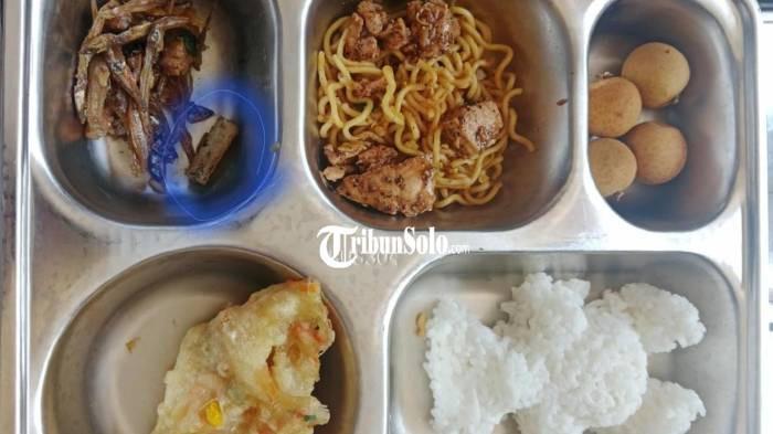 MENU MBG - Ilustrasi menu MBG, belum lama ini. Wakil Satgas Makan Bergizi Gratis (MBG) Purwanti membuka opsi menutup permanen Satuan Pelayanan Pemenuhan Gizi (SPPG) yang terkena suspend akibat kasus keracunan massal, termasuk SPPG Nusukan 4 dan SPPG Banyuanyar 1 Solo.