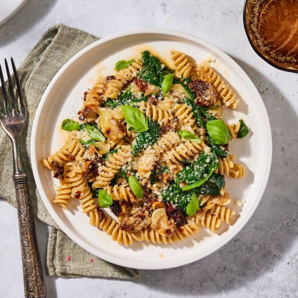 an image of the Baked Brie & Sun-Dried Tomato Pasta Credit: Photographer: Robby Lozano, Food Stylist: Marianne Williams, Prop Stylist: Josh Hoggle