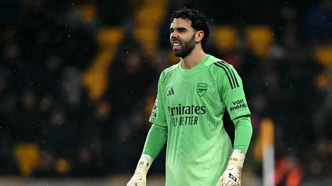 Apalagi, gol kedua Wolves terjadi pada menit injury time babak kedua yang berawal dari blunder David Raya. (AFP/Paul Ellis)